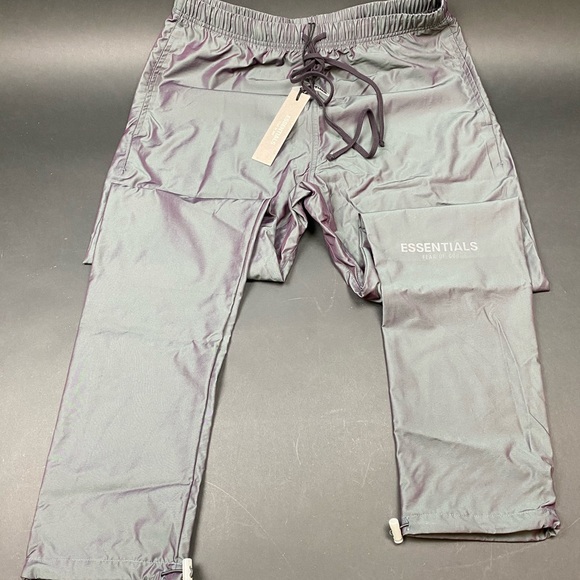 fear of god essentials track pants iridescent